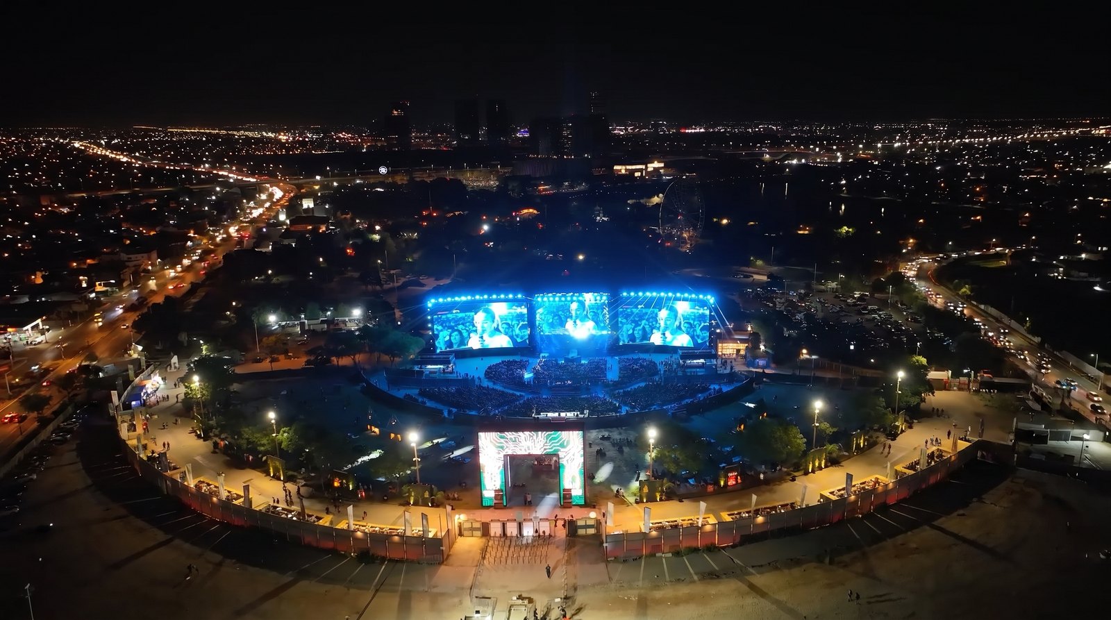 Aerial — three screens over Live Park